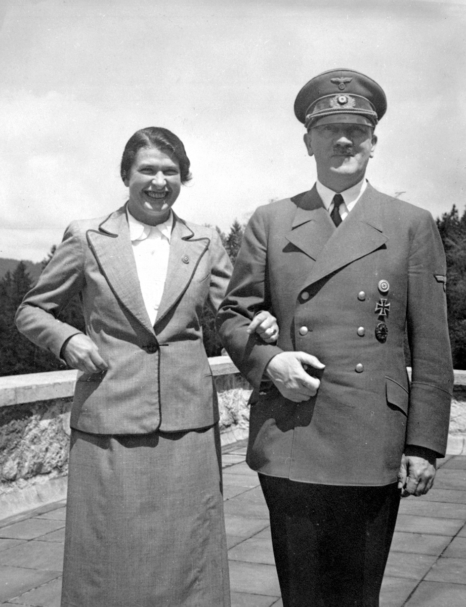 Adolf Hitler poses with his secretary Johanna Wolf for her 44th Birthday, from Eva Braun's albums